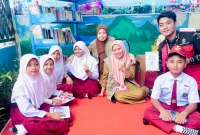 Program kerja “Pojok Literasi Digital Desa Marannu dengan Program Sinkronisasi Aplikasi E-Pusda Maros Berbasis QR Code”. (Foto: Dok. Istimewa)